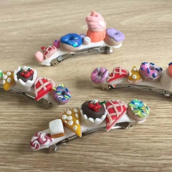 Polymer clay dessert charms on hair clips, made in a crafty party