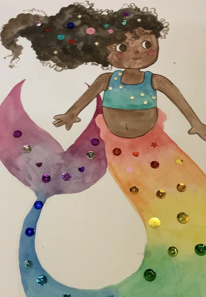 A watercolour mermaid with a rainbow tail covered in sequins