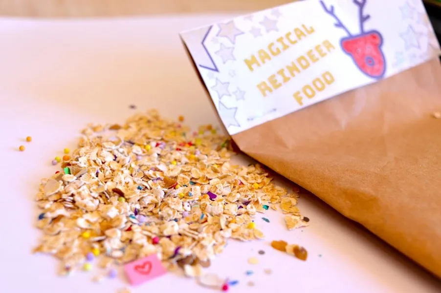 A paper bag labelled Magical Reindeer Food spilling oats and colourful sprinkles